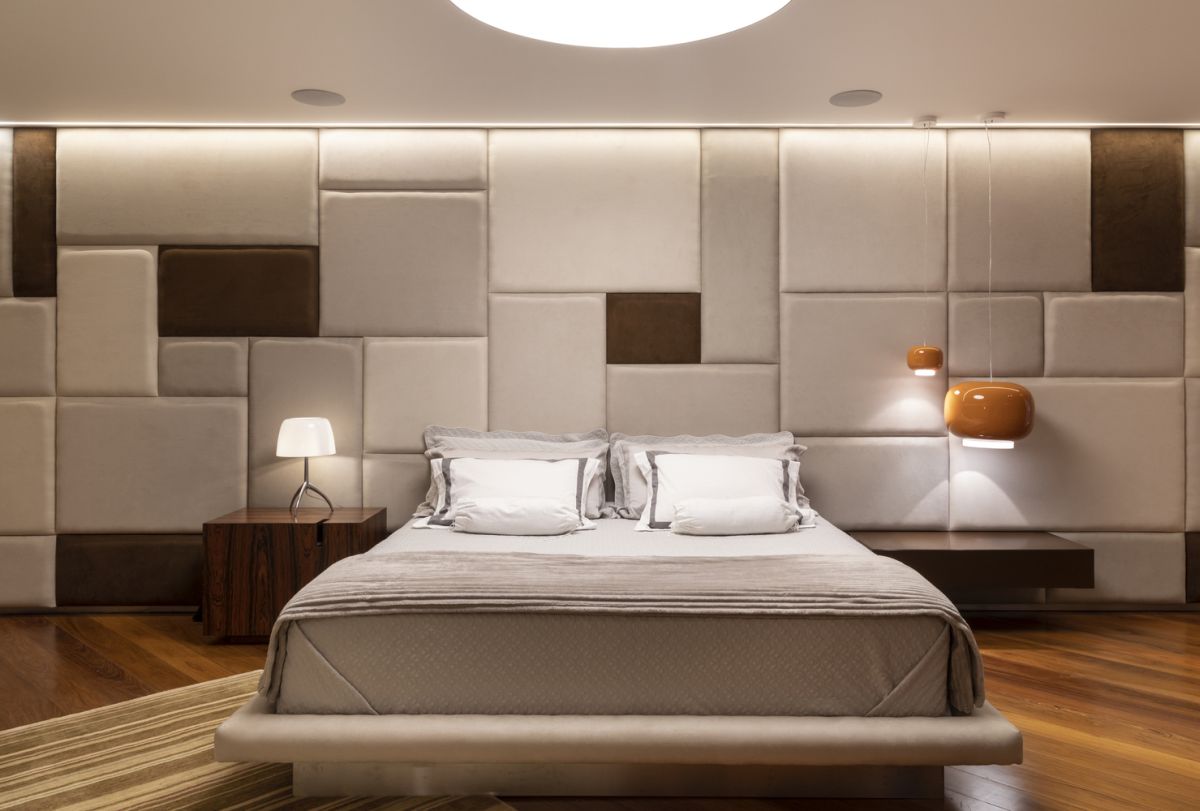The master bedroom features an accent wall which is basically a giant headboard