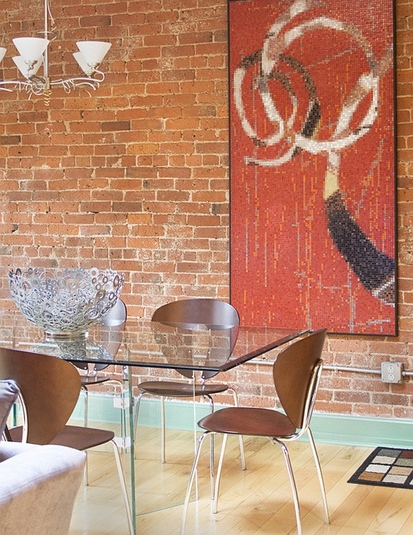 Exposed brick wall adds an eclectic element to the space