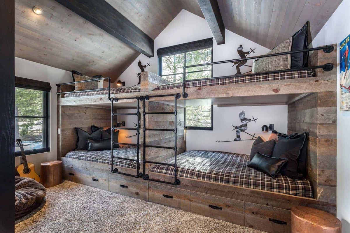 One of the bedrooms has custom-built bunk beds with plenty of storage inside the drawers
