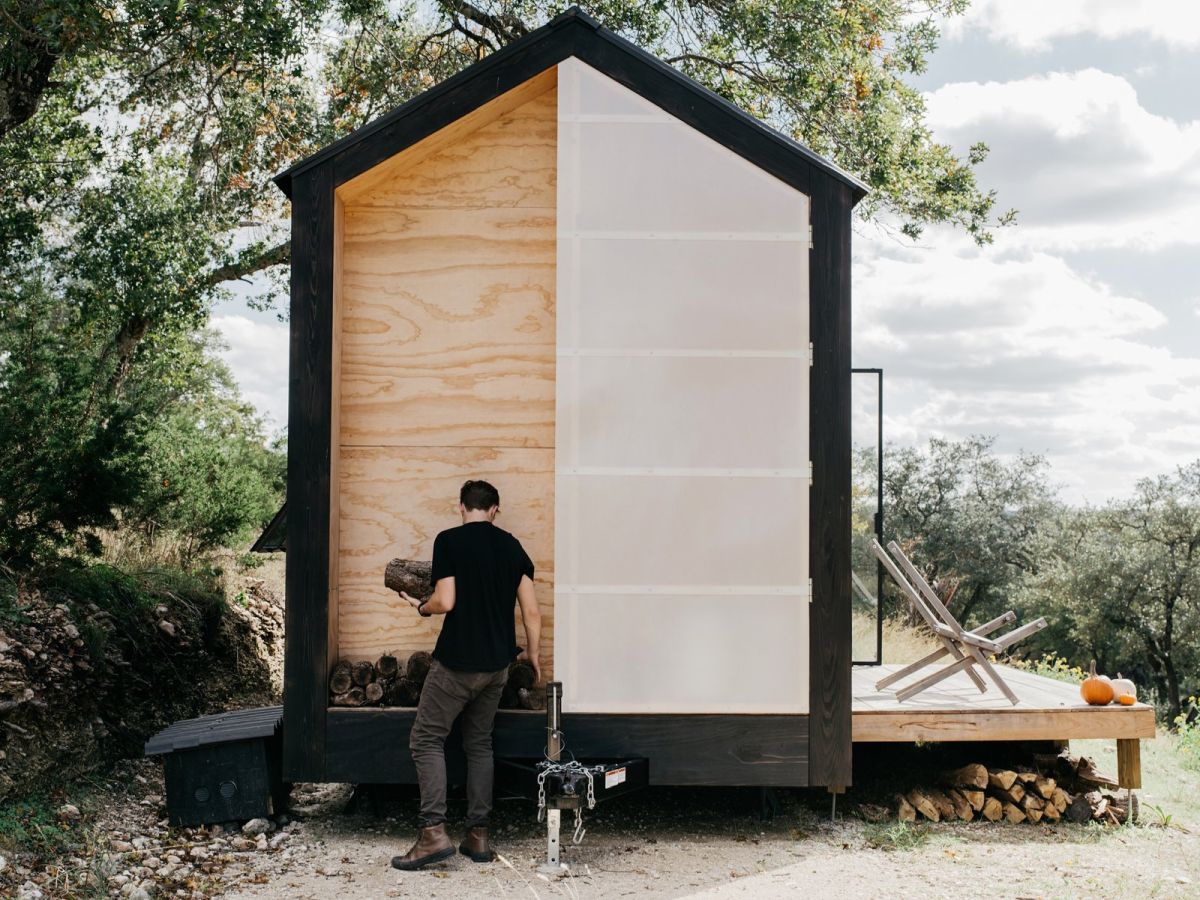 One side of the cabin features this fiberglass panel designed to conceal service/storage area