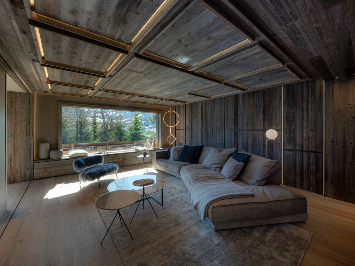 The living room and most other spaces are almost entirely designed using reclaimed wood