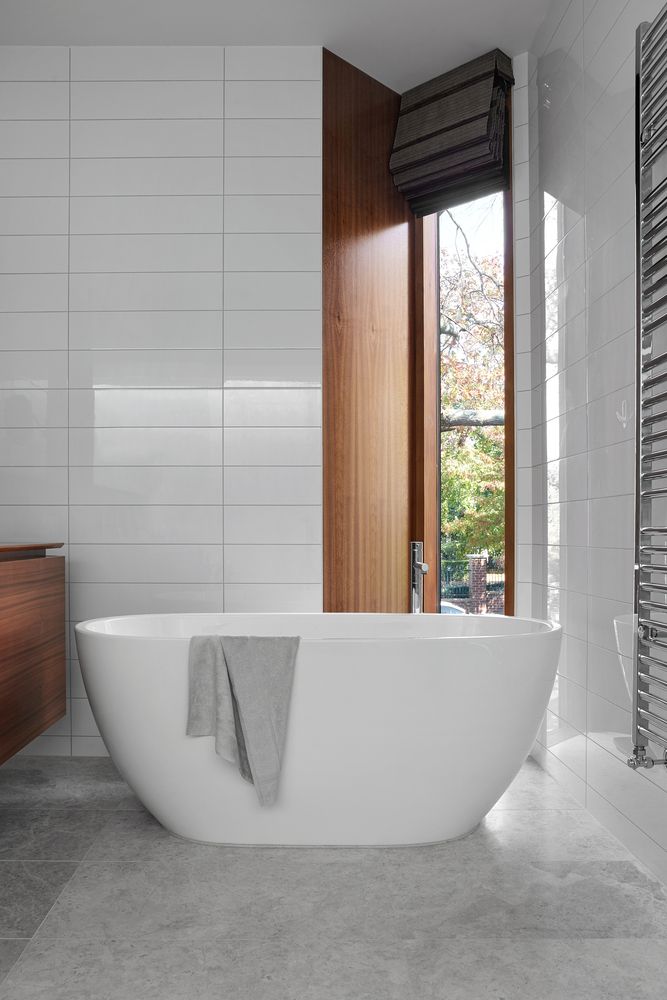 The signature narrow windows complement most spaces, including the elegant bathrooms