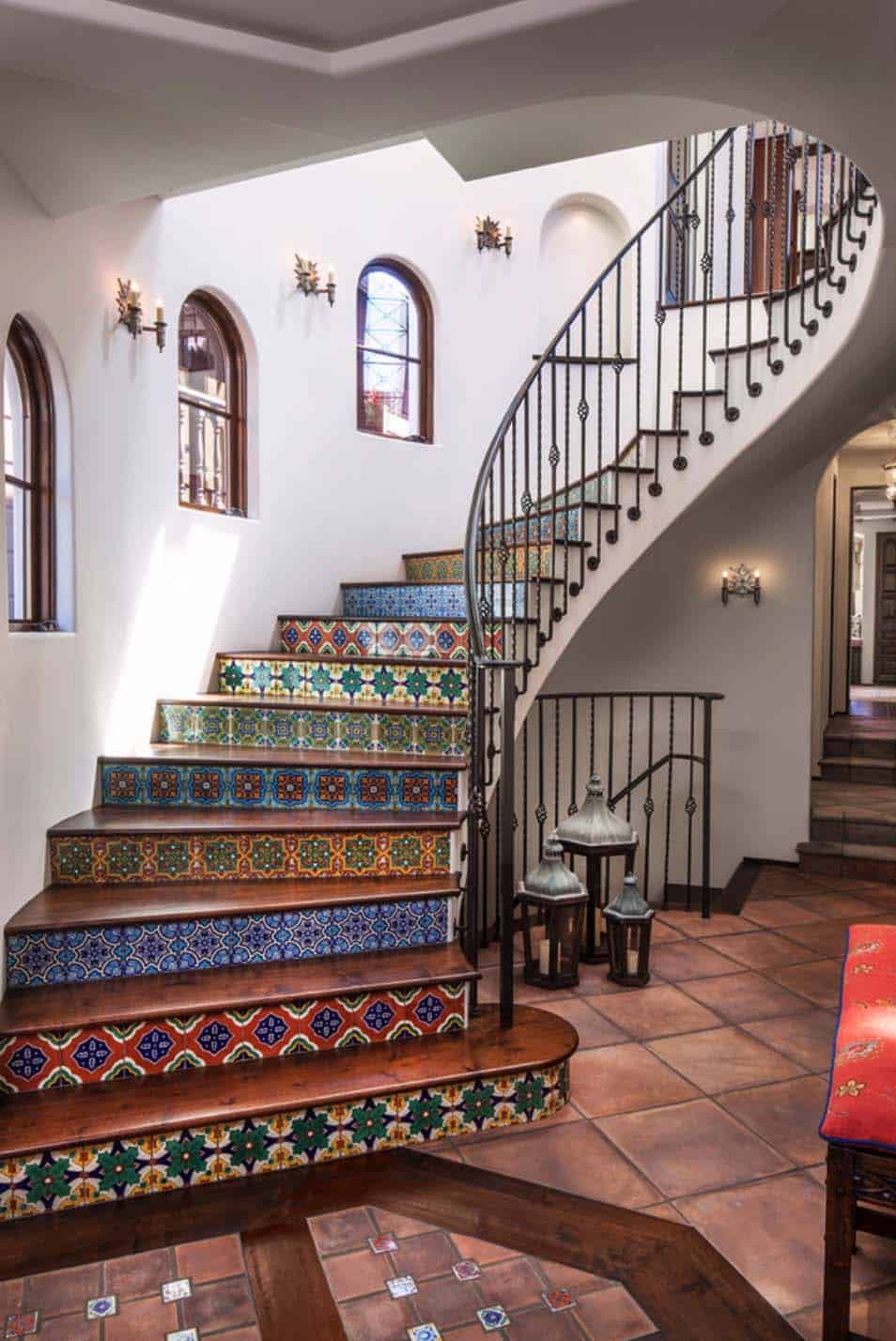 The staircase is a major focal point for the entire house thanks to its colorful tile design