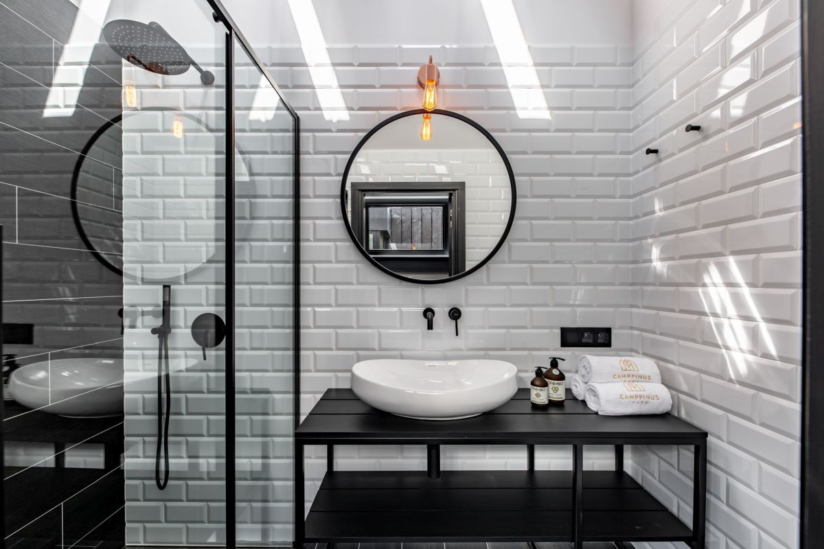 White subway tiles give the bathroom a timeless appearance