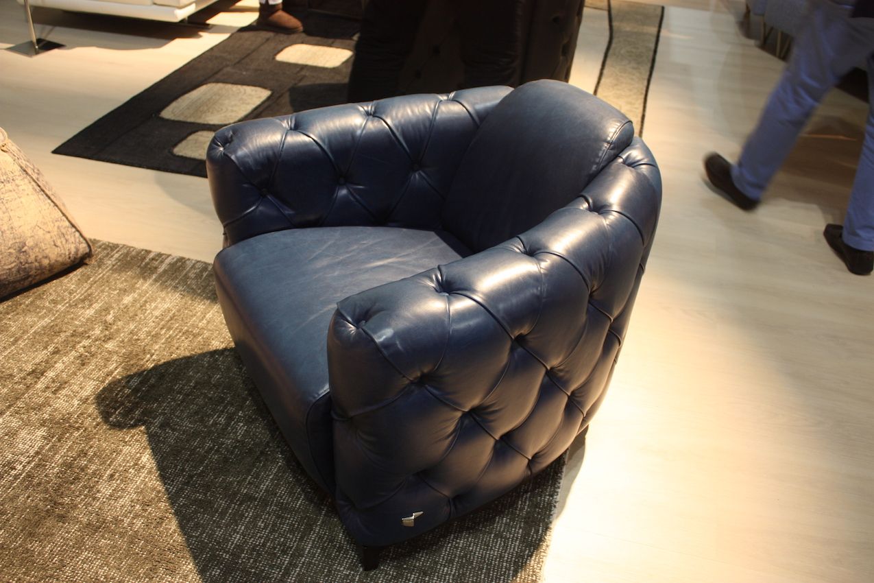 Calla Italia's tufted armchair has a beautiful finish.