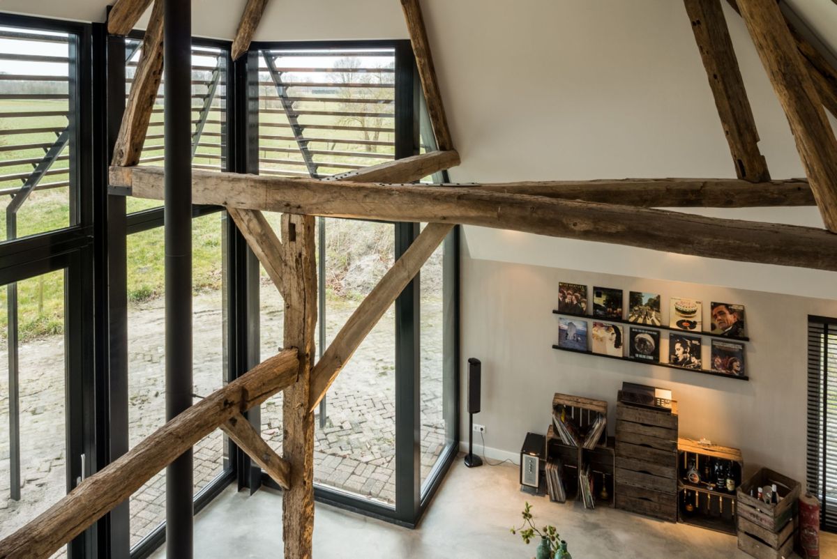 New large windows and glass doors create a strong connection between the house and its immediate surroundings